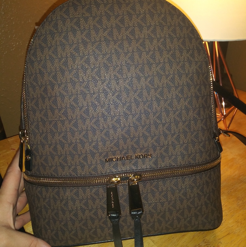 Michael Kors back pack style Hand Bags